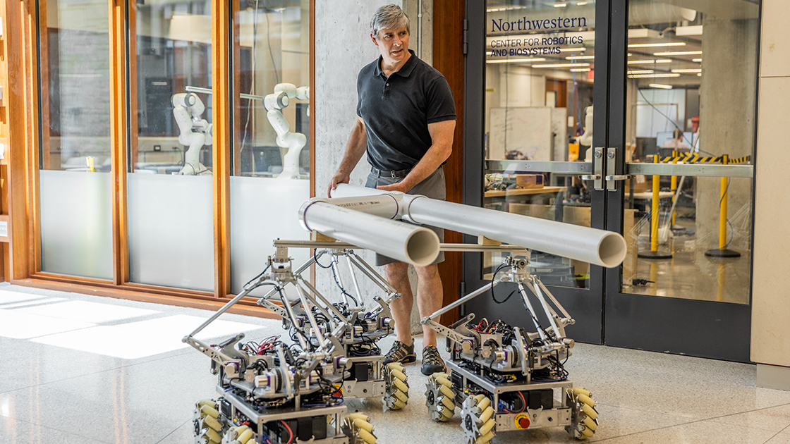 Professor Kevin Lynch directs the three Omnid mocobots.